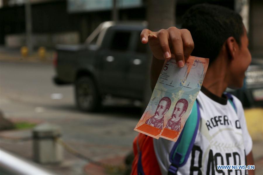 VENEZUELA-CARACAS-ECONOMY-CURRENCY