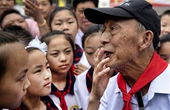 &ldquo;希望老人&rdquo;的第100次老區(qū)助學之旅