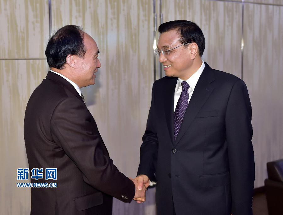 1月22日，中國國務(wù)院總理李克強在瑞士蘇黎世會見國際電信聯(lián)盟秘書長趙厚麟。 新華社記者 李濤 攝 
